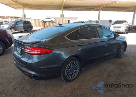 2017 Ford Fusion Energi Platinum z USA, uszkodzony, nr VIN 3FA6P0SU0HR239085